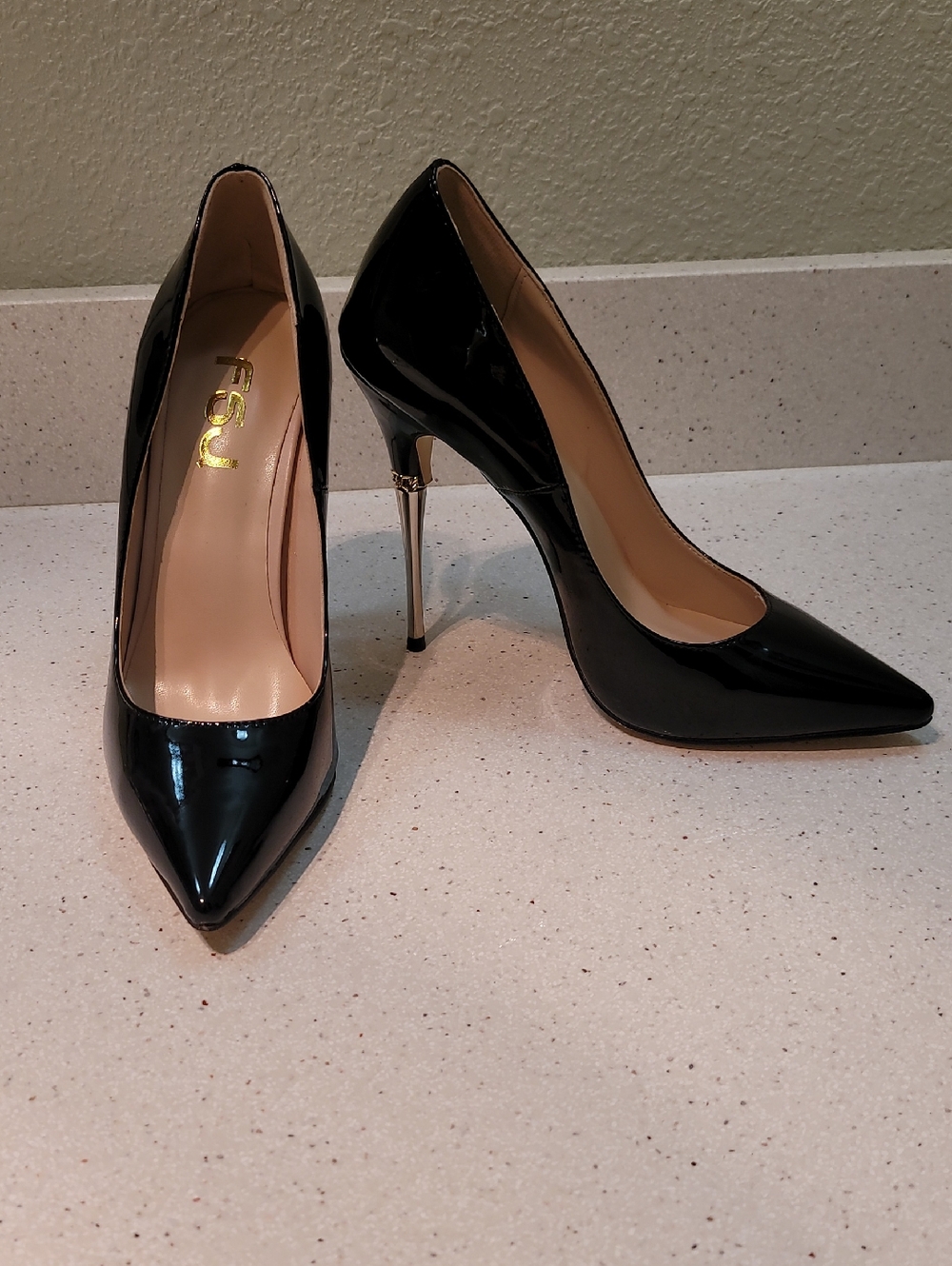 FSJ Black Patent Pointed Toe Stiletto Pumps with Nude Interior